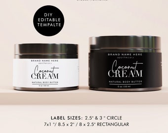 Può includere: Due barattoli neri con etichette bianche. Le etichette riportano il testo "BRAND NAME HERE apothecary Coconut CREAM NATURAL BODY BUTTER 6 oz 100 ml". I barattoli sono su una superficie marrone chiaro. Il testo "LABEL SIZES: 2.5" & 3" CIRCLE 7x1" / 8.5 x 2" / 8 x 2.5" RECTANGULAR" è sotto i barattoli.