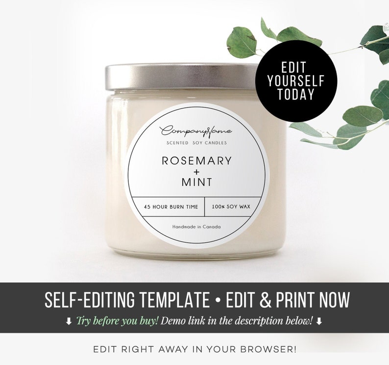 May include: A white candle jar with a silver lid and a white label. The label has black text that reads "Companyfame Scented Soy Candles Rosemary + Mint 45 Hour Burn Time 100% Soy Wax Handmade in Canada".