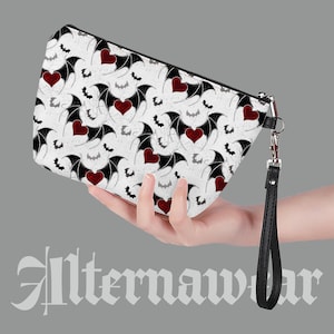 Astuccio per il trucco con cerniera in pelle PU con cuore e ali Goth