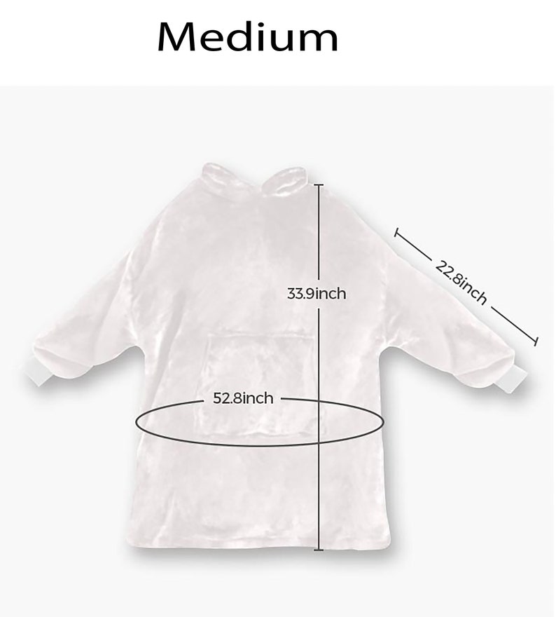 Może przedstawiać: Biały koc z kapturem i rękawami, o wymiarach 33,9 cala wysokości, 22,8 cala szerokości i 52,8 cala obwodu. Koc ma kieszeń z przodu.