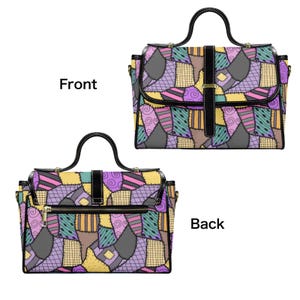 May include: A patchwork-style handbag with a black handle and strap. The bag features a variety of colorful fabric patches in shades of purple, yellow, green, and gray. The front of the bag has a flap closure with a black strap and gold buckle.