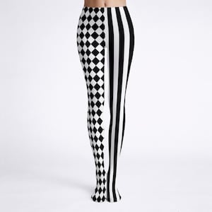 May include: Leggings in black and white with a bold design. One leg has a pattern of black diamonds on a white background, the other has vertical black stripes on a white background. The leggings are made of a stretchy material.