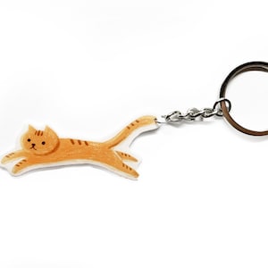 Running Ginger cat keychain with screw clasp in shrink plastic handmade original design