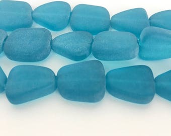 Pacific blue glass cultured seaglass, translucent flat freeform beads, one strand, 6 pieces. Rumbled glass beads. Ocean blue glass beads.