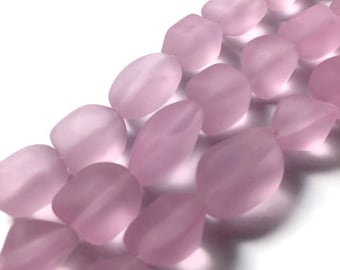 Beach glass, faux sea glass beads, pale pink. Strand of beads, soft blossom pink. 7 beads per strand.  10mm,  glass nugget beads.