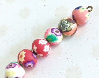 20 round polymer clay beads, 8mm bead mix, multiple colours and patterns. Random mix Fimo beads. Floral pattern beads.