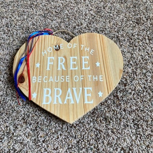 Home of the free because of the brave quote decor