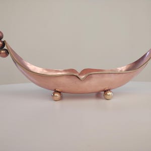 Fantastic hand made copper center bowl / fruit bowl rimmed in brass gondola shape
