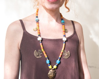 Vintage necklace with brass pendant and resin beads