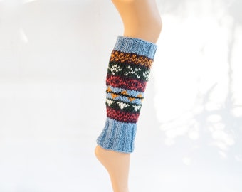Light blue colorful leg warmers made of sheep's wool lined with fleece, patterned, blue, green, red