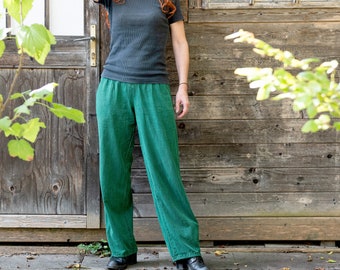 Wide Ännlin trousers made of fine, soft cotton, malachite green