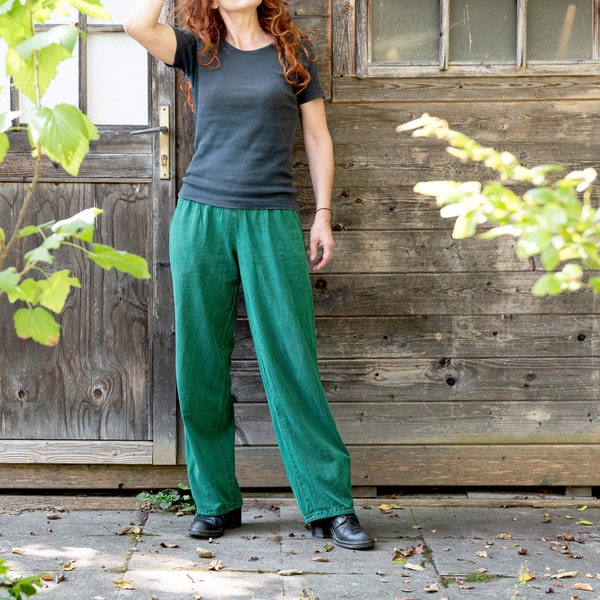 Wide Ännlin trousers made of fine, soft cotton, malachite green