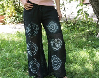 Butterfly trousers in sheer fabric, tie-dyed black or ink blue, circles