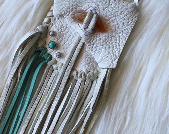 White leather medicine pouch