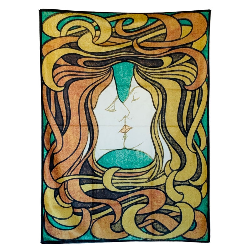 Full isolated view of The Kiss tapestry showing two intertwined faces framed by bold yellow, orange, green and black flowing forms.