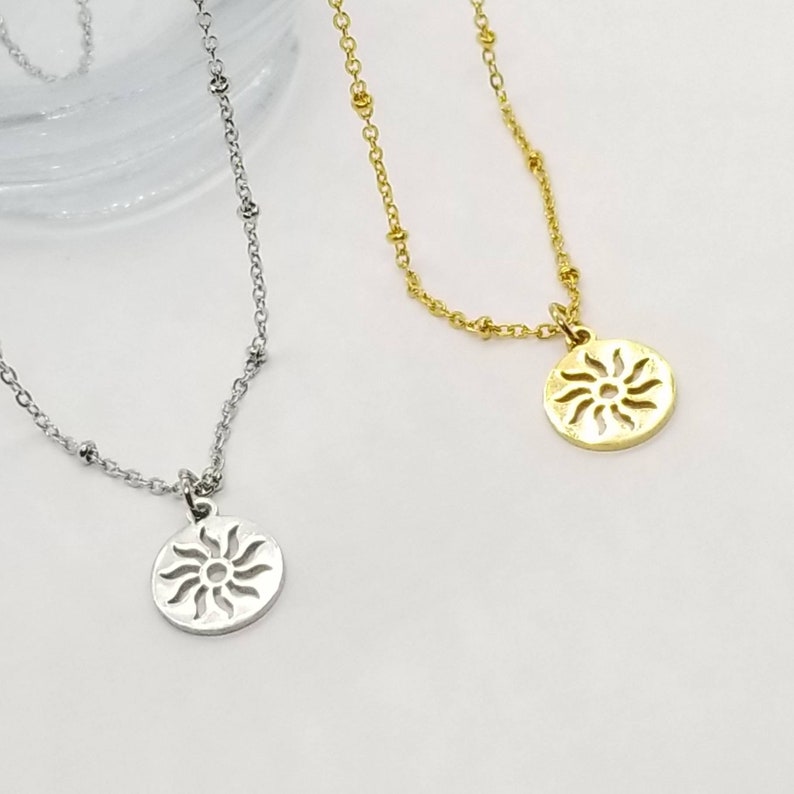sun symbol necklace