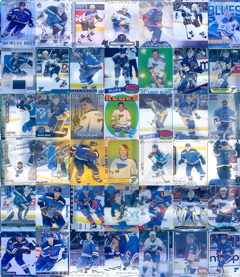 May include: A collage of trading cards featuring hockey players from the St. Louis Blues. The cards are arranged in a grid pattern and feature various players, including Brett Hull, Pierre Targeon, and Garry Unger. The cards are all in the team's colours of blue and gold.
