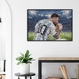 May include: Framed mosaic art print featuring a soccer player in a light blue and white jersey with the number 10. The artwork is composed of numerous small images, creating a detailed portrait. The background shows a green field and a blue sky.
