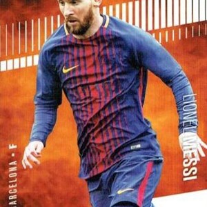 May include: A trading card featuring a soccer player in a blue and red striped jersey. The card has the text "Leaf" in the upper left corner and "HYPE!" in the upper right. The player's name, "Lionel Messi", is printed vertically on the right side.