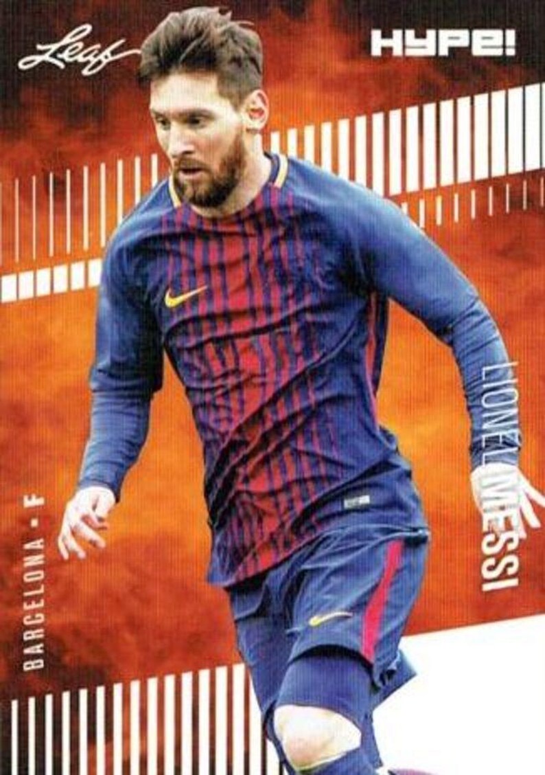 May include: A trading card featuring a soccer player in a blue and red striped jersey. The card has the text "Leaf" in the upper left corner and "HYPE!" in the upper right. The player's name, "Lionel Messi", is printed vertically on the right side.