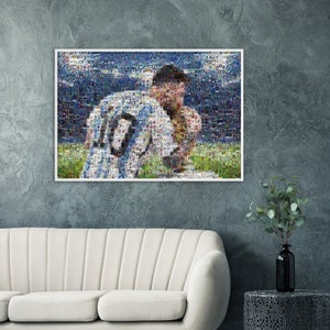 May include: A framed mosaic art print featuring a soccer player in a white and blue jersey with the number 10. The artwork is displayed on a gray wall above a white sofa. The mosaic is composed of many small images.