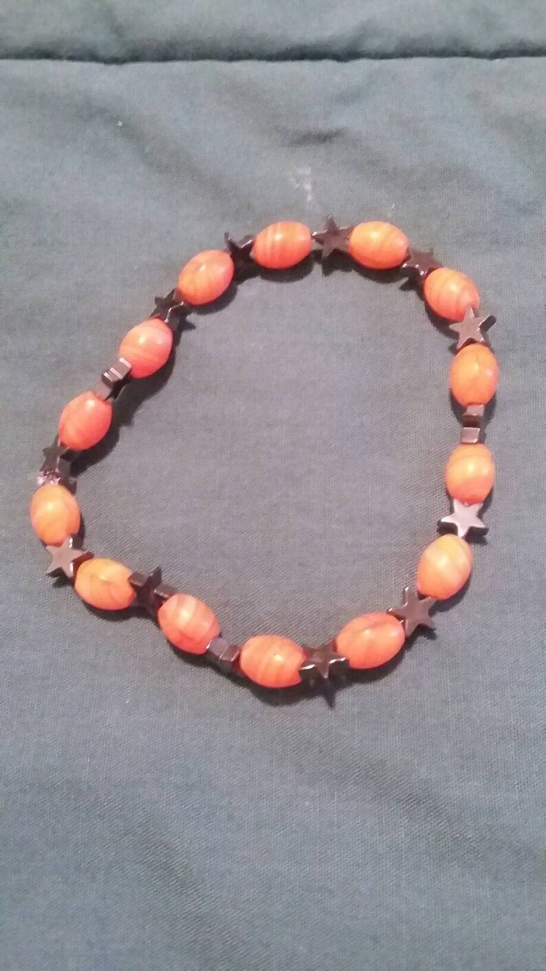 Night in the Woods Saint Rubello Stars and Flames Beaded Bracelet