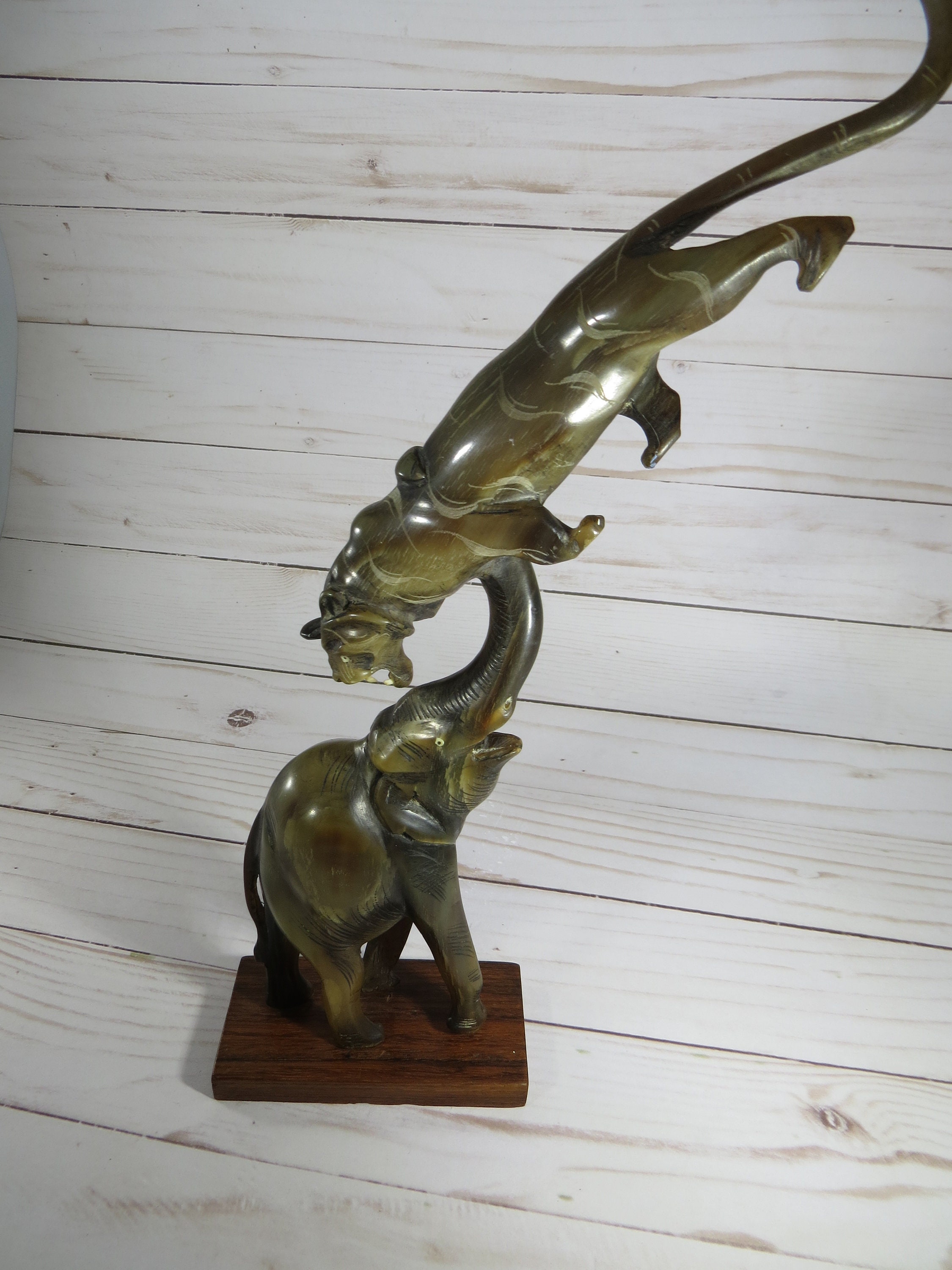 Elephant and Tiger Fight Figurine