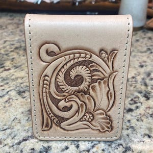 Cartera de cuero con bolsillo delantero
