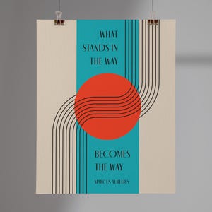 May include: A motivational quote poster with a teal background and a red circle with black lines. The quote reads "What stands in the way becomes the way" by Marcus Aurelius.