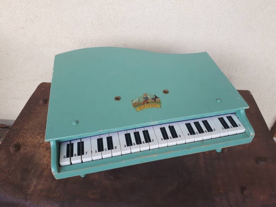 vintage wooden toy piano