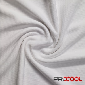 May include: White fabric with a textured, waffle-like pattern. The fabric is folded and twisted, creating a swirling effect. The text "PROCOOL" is visible in the lower right corner.