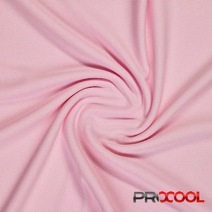 May include: A close-up of a pink, textured fabric with a subtle grid pattern. The fabric is gathered and twisted, creating a swirling effect.