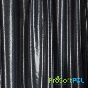 May include: Close-up of a silver metallic fabric with a subtle textured pattern. The fabric is draped in soft folds, creating a luxurious and elegant look. The fabric is eco-friendly and waterproof.