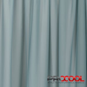 May include: A close-up of a light blue sheer fabric with a subtle sheen. The fabric is smooth and drapes well. The fabric is made by ProCool Athletic Performance Fabrics.