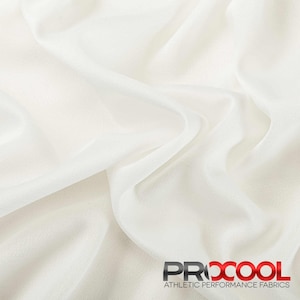 May include: White athletic performance fabric with a textured surface. The fabric is made by ProCool.