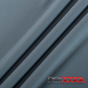 May include: A close-up of a blue athletic performance fabric with a textured surface. The fabric is folded in a way that shows the texture and drape. The text "PRXCOOL ATHLETIC PERFORMANCE FABRICS" is visible at the bottom of the image.