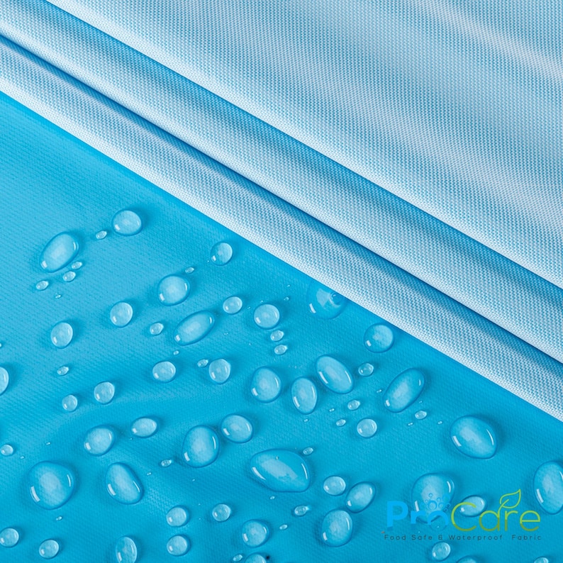 May include: A close-up of a light blue fabric with water droplets on a blue surface. The fabric is labeled "ProCare Food Safe & Waterproof Fabric".