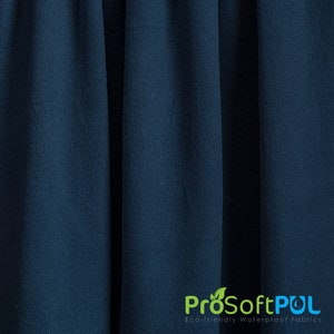May include: Close-up of a dark blue fabric with a textured surface. The fabric is folded in thirds. The ProSoftPUL logo is visible at the bottom of the image. The logo is green and white with the text "ProSoftPUL Eco-friendly Waterproof Fabrics".