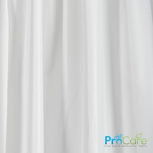 May include: White sheer fabric backdrop with the text "ProCare Food Safe & Waterproof Fabric" in blue and green.