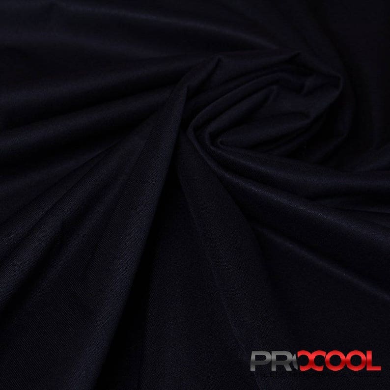 May include: Close-up of a dark blue fabric with a smooth, silky texture. The fabric is folded and draped, showcasing its drape and flow.