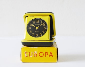 Yellow and Black Mid Century Travel Alarm Clock,  by Europa, Germany. New Old Stock.