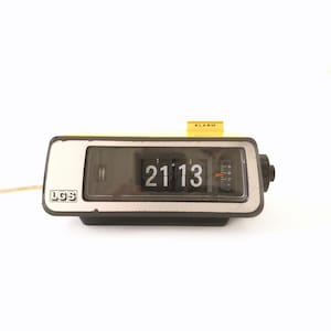 Yellow Mid Century Flip Alarm Clock, made by LGS, China