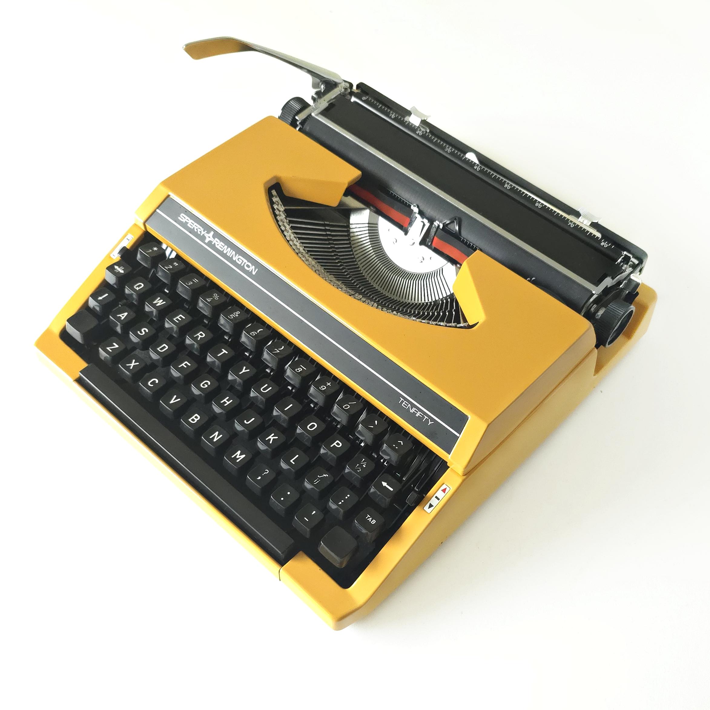 Sperry Remington Tenfifty Typewriter | Burnt Yellow | 1970s