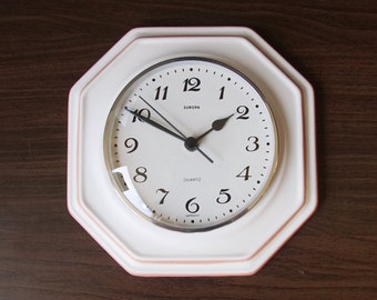 Mid Century Ceramic Wall Clock, Off White and Salmon Pink, Relief decor, by Europa, West Germany