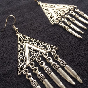Brand new dangling earrings from Uzbekistan. Traditional Central Asian design . Have a taste of ancient Silk Road in your collection.