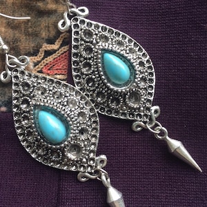 Brand new dangling earrings from Uzbekistan. Traditional Central Asian design . Have a taste of ancient Silk Road in your collection.