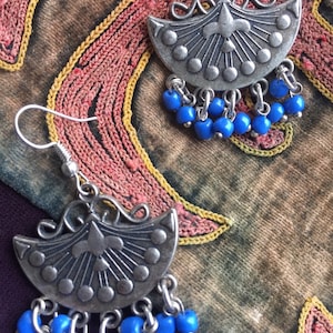 Brand new dangling earrings from Uzbekistan. Traditional Central Asian design . Have a taste of ancient Silk Road in your collection.