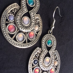 Brand new dangling earrings from Uzbekistan. Traditional Central Asian design . Have a taste of ancient Silk Road in your collection.