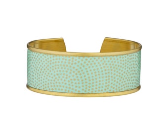 Brass cuff bracelet and light green Japanese paper with golden polka dots