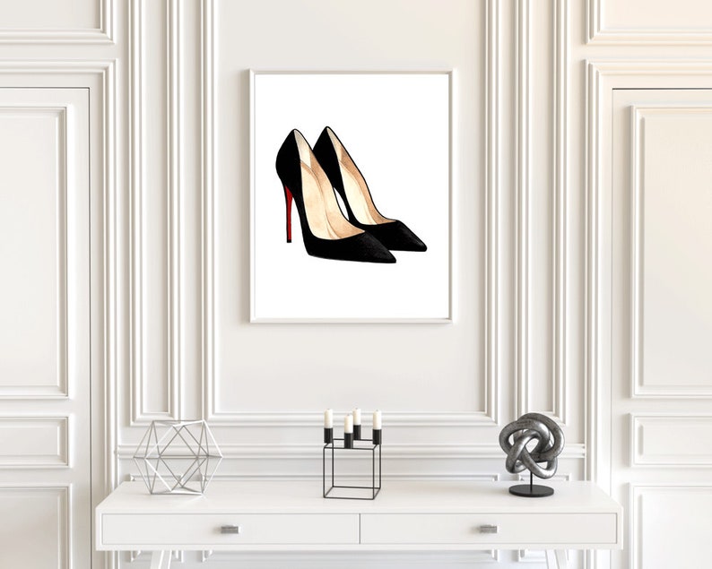 May include: A printable art print featuring a pair of black high-heeled shoes with red soles.